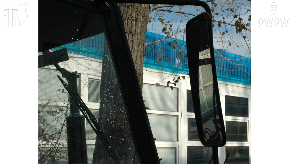 Material for the question: If you go straight in a tractor with a trailer, what should you see in properly-adjusted external mirrors?